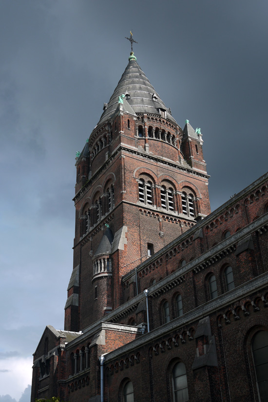 Antwerp, church and cloudy sky