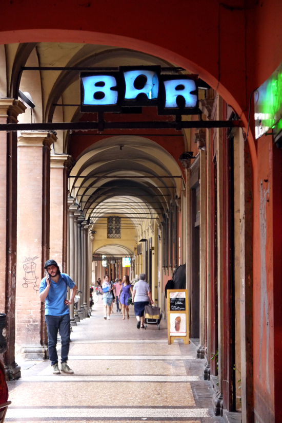 Bologna, arcade with bar