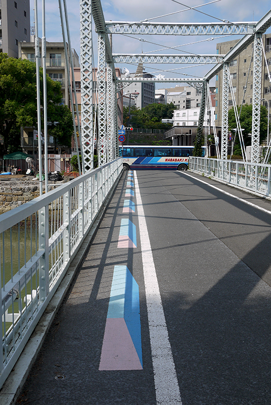 Nagasaki, bridge with bus near Dejima